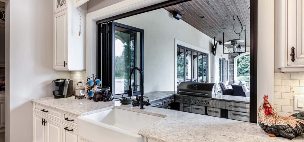 bar window for kitchen to outdoor patio for entertaining
