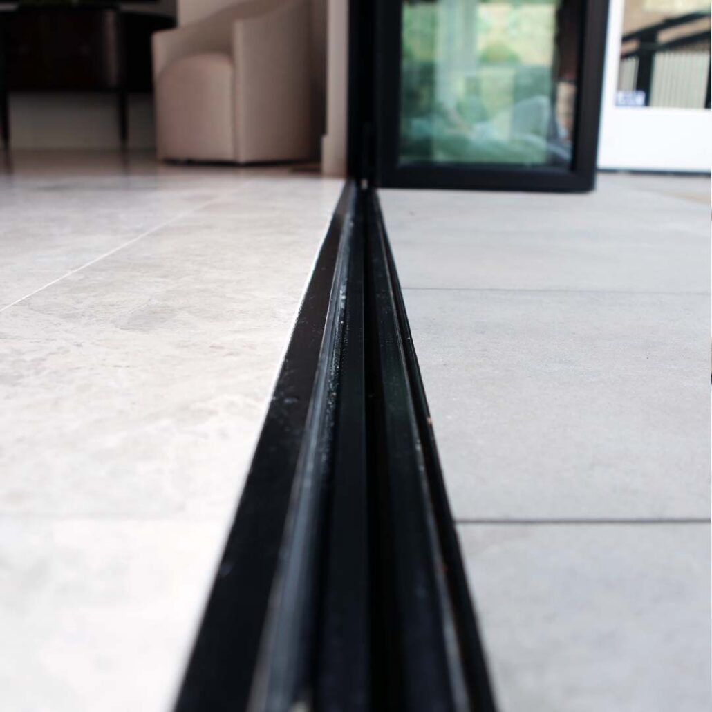 track system on folding sliding doors needs maintenance and cleaning
